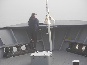 Bowman wearing Sitka Sneakers